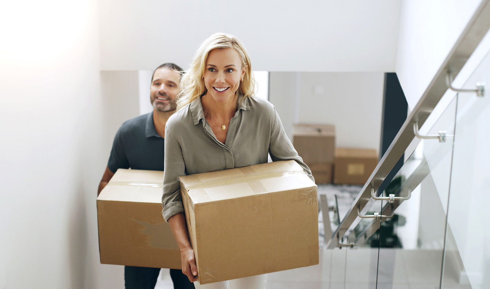 Reaching-special-milestones-buying-house-iStock-1467959886