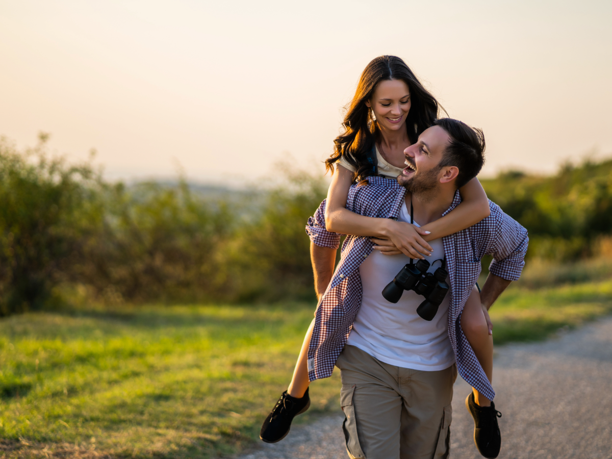 css-36-Couple with binoculars piggyride